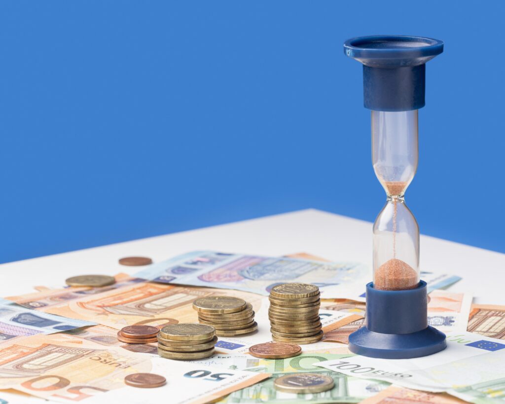 hourglass-pile-coins