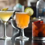 102561327_3-Cocktails-on-Bar_Photo-by-Meredith-4cbb7cc1a5d3451abf298d8fef7909b9