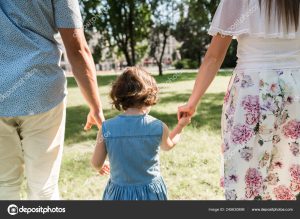 Smiling happy family and young funny daughter. Family concept.